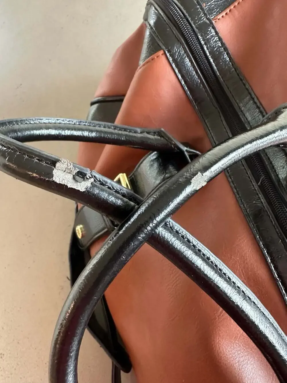 Steve Madden Two-Tone Brown and Black Faux Leather Weekender Duffel Bag